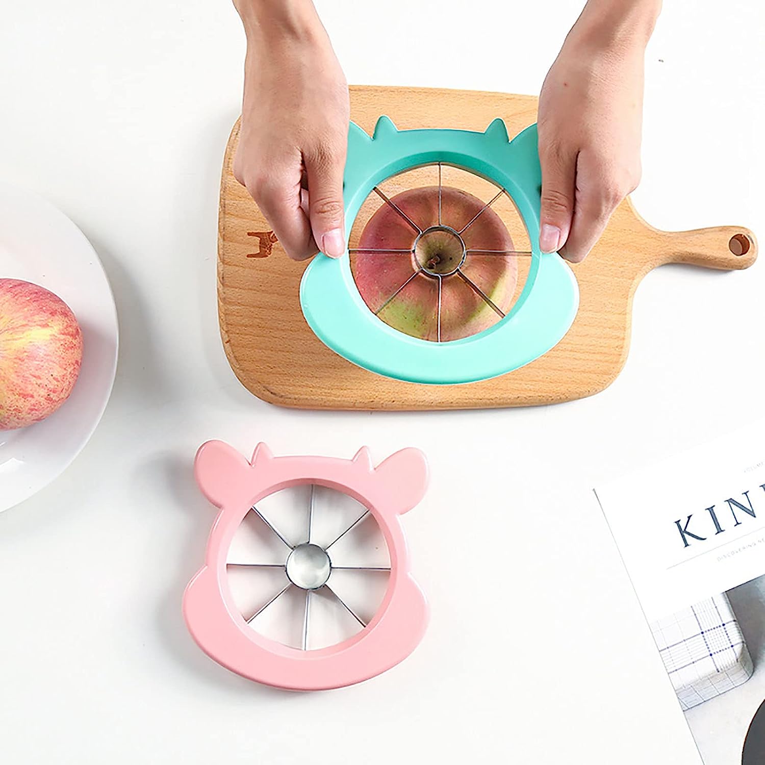 Apple corer and slicer tool, with stainless steel and plastic components for easy use. Apple corer and slicer tool, with stainless steel and plastic components for easy use.